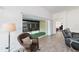 Bright living room with view of a relaxing screened porch at 3769 Causey Ct, The Villages, FL 32163