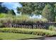 Arlington Ridge community entrance with landscaped grounds at 4127 Arlington Ridge Blvd, Leesburg, FL 34748