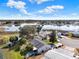 An aerial view showing the neighborhood layout and proximity to the lake at 5338 Tigers Tail, Leesburg, FL 34748