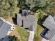 Aerial view of the home's roof, front yard, and surrounding landscape shows the property and its location at 5338 Tigers Tail, Leesburg, FL 34748