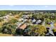 Aerial view of homes and neighborhood landscape at 5513 Shriver St, Leesburg, FL 34748