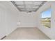 This garage has a window, a sink, and a concrete floor at 7260 Draper Ave, The Villages, FL 34762