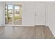 A close-up view of the sliding doors leading to an outdoor screened patio at 7260 Draper Ave, The Villages, FL 34762