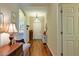 Welcoming foyer with wood floors, decorative accents, and a bright entrance door at 752 Chacall Loop, Mount Dora, FL 32757