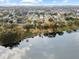 Aerial view showing home's location on a lake at 819 Bolivar St, The Villages, FL 32159