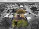 Aerial view of house and surrounding neighborhood at 819 Bolivar St, The Villages, FL 32159