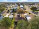 Aerial view of house and surrounding neighborhood at 819 Bolivar St, The Villages, FL 32159