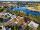 Aerial view of home near a lake community at 819 Bolivar St, The Villages, FL 32159