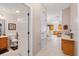 Hallway with view of kitchen and bathroom at 819 Bolivar St, The Villages, FL 32159