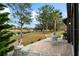 Spacious patio with seating overlooking the lake at 819 Bolivar St, The Villages, FL 32159