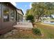 Brick patio with seating area and lake views at 819 Bolivar St, The Villages, FL 32159