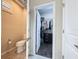 Neat closet space with organized shelving and hanging rods, showcasing efficient storage solutions and well-lit interior at 113 Bayou Bend Rd, Groveland, FL 34736