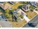 Aerial view showcasing the property's layout, landscaping, surrounding neighborhood, and proximity to community features at 12455 Se 92Nd Ter, Summerfield, FL 34491