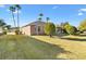 Green backyard, exterior view of lanai and ample space at 12455 Se 92Nd Ter, Summerfield, FL 34491