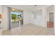Dining area with tile flooring and sliding glass doors to a patio at 12455 Se 92Nd Ter, Summerfield, FL 34491