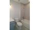 A bathroom features a tiled shower over a tub and modern fixtures at 14365 Crest Palm Ave, Windermere, FL 34786