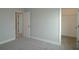 A bedroom offers access to the closet and hall at 14365 Crest Palm Ave, Windermere, FL 34786