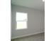 A bedroom with natural light at 14365 Crest Palm Ave, Windermere, FL 34786