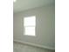 A window brightens a room with natural light at 14365 Crest Palm Ave, Windermere, FL 34786