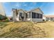 Great backyard with an outdoor seating area, ideal for relaxing or entertaining at 1555 Ward Ct, The Villages, FL 32162