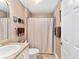 Cozy bathroom with shower/tub combo, single vanity and neutral walls at 1555 Ward Ct, The Villages, FL 32162