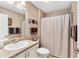 Bathroom featuring vanity and bath tub/shower combo at 1555 Ward Ct, The Villages, FL 32162