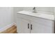 Bathroom vanity featuring black hardware, shaker cabinet doors, and modern sink at 1616 Bayhill Dr, The Villages, FL 32159