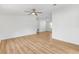 Neutral living space with light wood floors, neutral walls, and recessed lighting at 1616 Bayhill Dr, The Villages, FL 32159