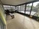Enclosed patio with a concrete floor and a view of the backyard at 167 N Cervidae Dr, Apopka, FL 32703