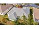 Aerial view of a single-story house with a large backyard and a two-car garage at 17145 Se 93Rd Yondel Cir, The Villages, FL 32162