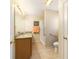 Bathroom with walk-in shower, granite countertop, and grab bars at 17145 Se 93Rd Yondel Cir, The Villages, FL 32162