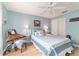 Light and airy bedroom with a queen-size bed at 17145 Se 93Rd Yondel Cir, The Villages, FL 32162