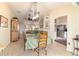 Spacious dining room with a view of the kitchen and living room at 17145 Se 93Rd Yondel Cir, The Villages, FL 32162