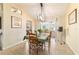 Dining room with a view into the kitchen and living room at 17145 Se 93Rd Yondel Cir, The Villages, FL 32162