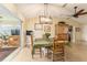 Dining area with view into living room and sunroom at 17145 Se 93Rd Yondel Cir, The Villages, FL 32162
