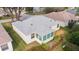 House back, showcasing sunroom and roofline at 17145 Se 93Rd Yondel Cir, The Villages, FL 32162