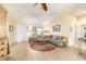 Spacious living area with a comfortable sectional and ample natural light at 17145 Se 93Rd Yondel Cir, The Villages, FL 32162