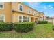 Spacious backyard with lawn and patio, perfect for outdoor entertaining at 17523 Promenade Dr, Clermont, FL 34711