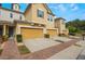 Charming townhome with a brick pathway and well-maintained landscaping at 17523 Promenade Dr, Clermont, FL 34711