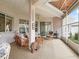 Spacious lanai with comfortable seating and plenty of natural light at 17652 Se 120Th Ter, Summerfield, FL 34491
