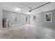 Attached garage with concrete floor and overhead door at 18315 Dells Cv, Groveland, FL 34736