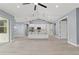 Open concept kitchen with island and stainless steel appliances at 18315 Dells Cv, Groveland, FL 34736