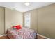 Cozy bedroom with a window allowing ample natural light at 18415 County Road 33, Groveland, FL 34736