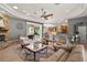 Spacious living room featuring tile floors, fireplace, recessed lighting, and an open floorplan to the kitchen at 2251 Lakeside Ter, Eustis, FL 32726