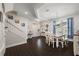 Bright dining area showcasing wood floors, a table with chairs, and natural light at 2455 Hastings Blvd, Clermont, FL 34711