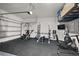 Home gym with weights, cardio equipment, and TV at 2455 Hastings Blvd, Clermont, FL 34711