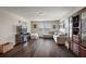 Spacious living room with a comfortable gray sofa, wood floors, and plenty of natural light at 2455 Hastings Blvd, Clermont, FL 34711