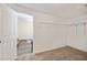 Bedroom features carpet flooring, an open closet and an entrance to another room at 2685 Cr 776, Webster, FL 33597