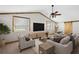 Cozy living room with vaulted ceilings, wood beams, modern furniture, and a fan at 2685 Cr 776, Webster, FL 33597