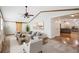 Bright living room features vaulted ceilings, exposed wood beams, and modern furnishings at 2685 Cr 776, Webster, FL 33597